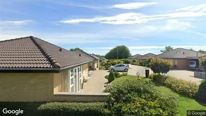 Andelsboliger til salg i Them - Foto fra Google Street View Andelsboliger til salg i Them - Foto fra Google Street View